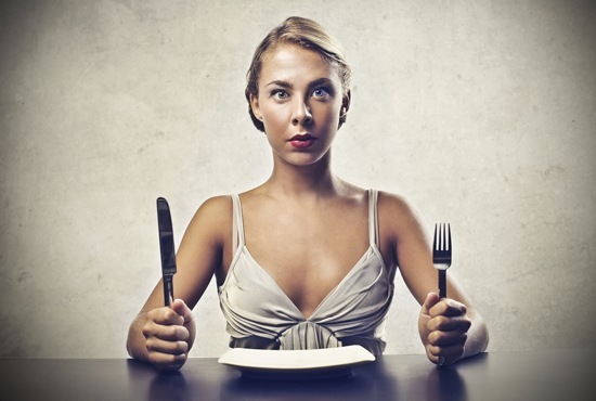 hungry-woman-with-empty-plate